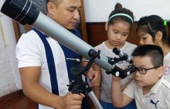 kids with telescope